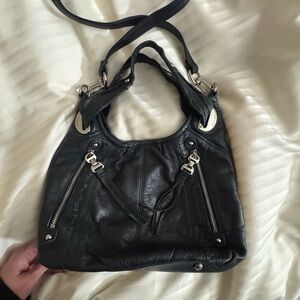 Black Soft Leather Shoulder or crossbody Bag with Silver hardware.